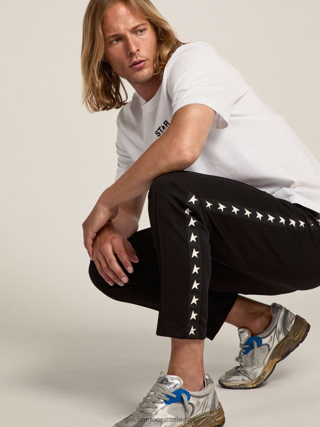black joggers with white stars on the sides FN20N764 Men Golden Goose