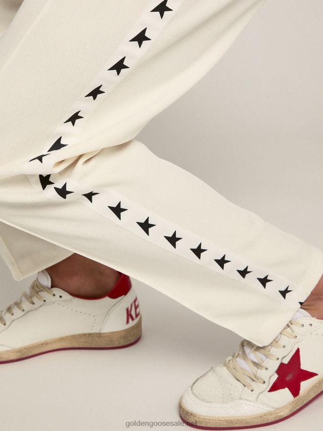 white joggers with black stars on the sides FN20N742 Men Golden Goose