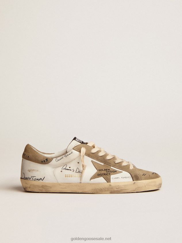 Super-Star sneakers in white leather with dove-gray suede inserts and all-over black lettering FN20N511 Men Golden Goose