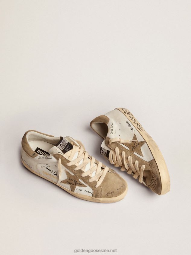 Super-Star sneakers in white leather with dove-gray suede inserts and all-over black lettering FN20N511 Men Golden Goose