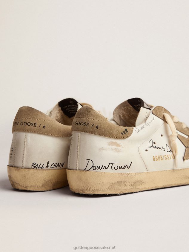 Super-Star sneakers in white leather with dove-gray suede inserts and all-over black lettering FN20N511 Men Golden Goose