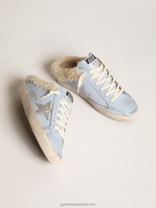 Super-Star Sabots in powder-blue leather with silver glitter star and beige shearling lining FN20N274 Women Golden Goose