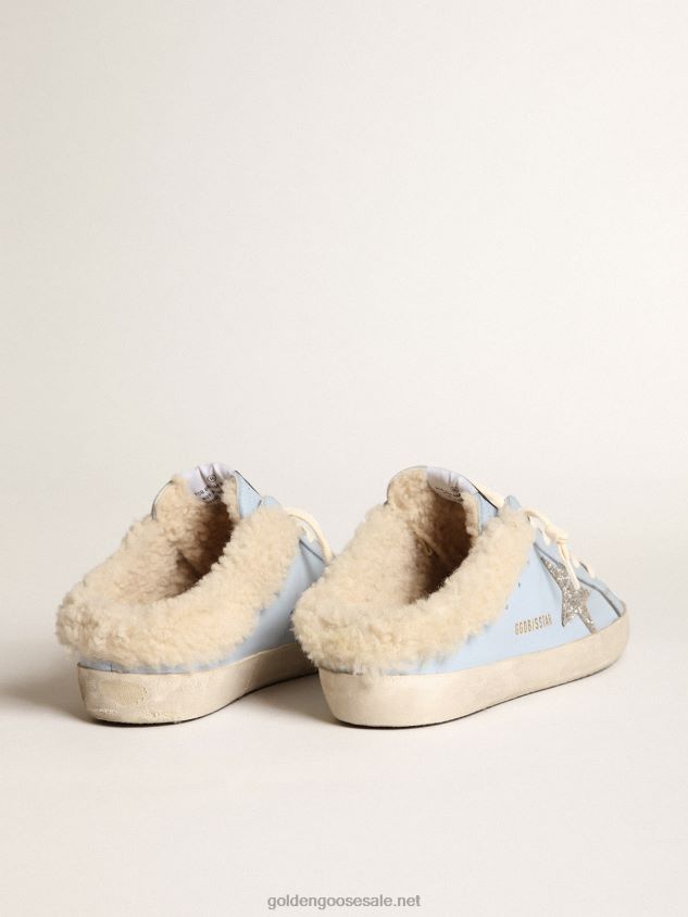 Super-Star Sabots in powder-blue leather with silver glitter star and beige shearling lining FN20N274 Women Golden Goose