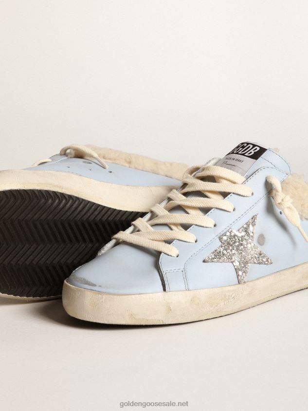 Super-Star Sabots in powder-blue leather with silver glitter star and beige shearling lining FN20N274 Women Golden Goose