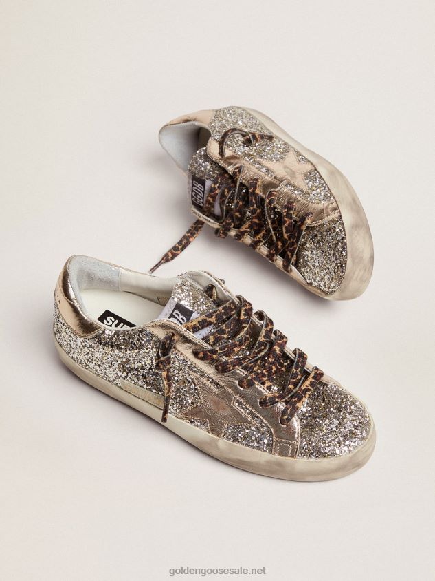 Super-Star sneakers in platinum-colored glitter with star and heel tab in tone-on-tone laminated leather FN20N286 Women Golden Goose