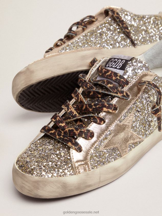 Super-Star sneakers in platinum-colored glitter with star and heel tab in tone-on-tone laminated leather FN20N286 Women Golden Goose