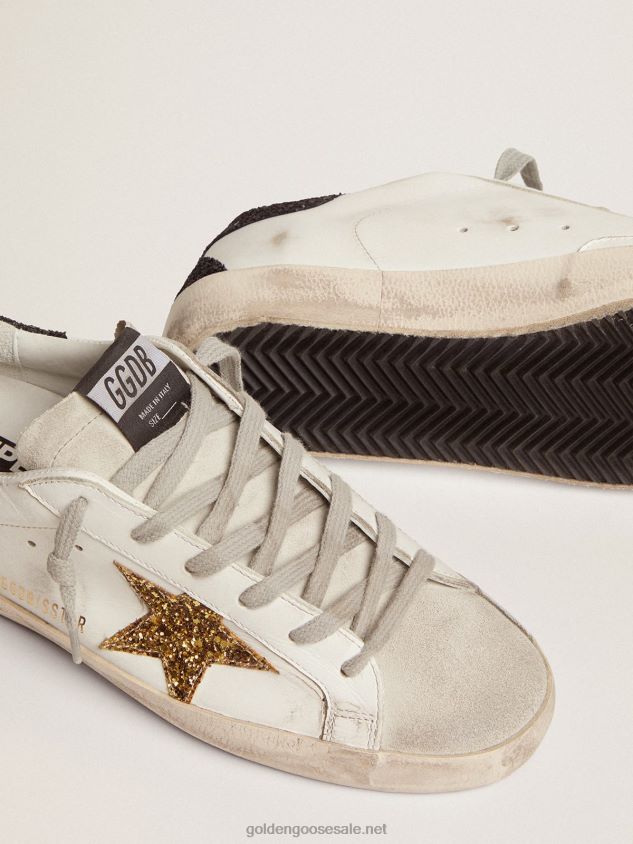 Super-Star sneakers with gold star and glittery black heel tab FN20N277 Women Golden Goose